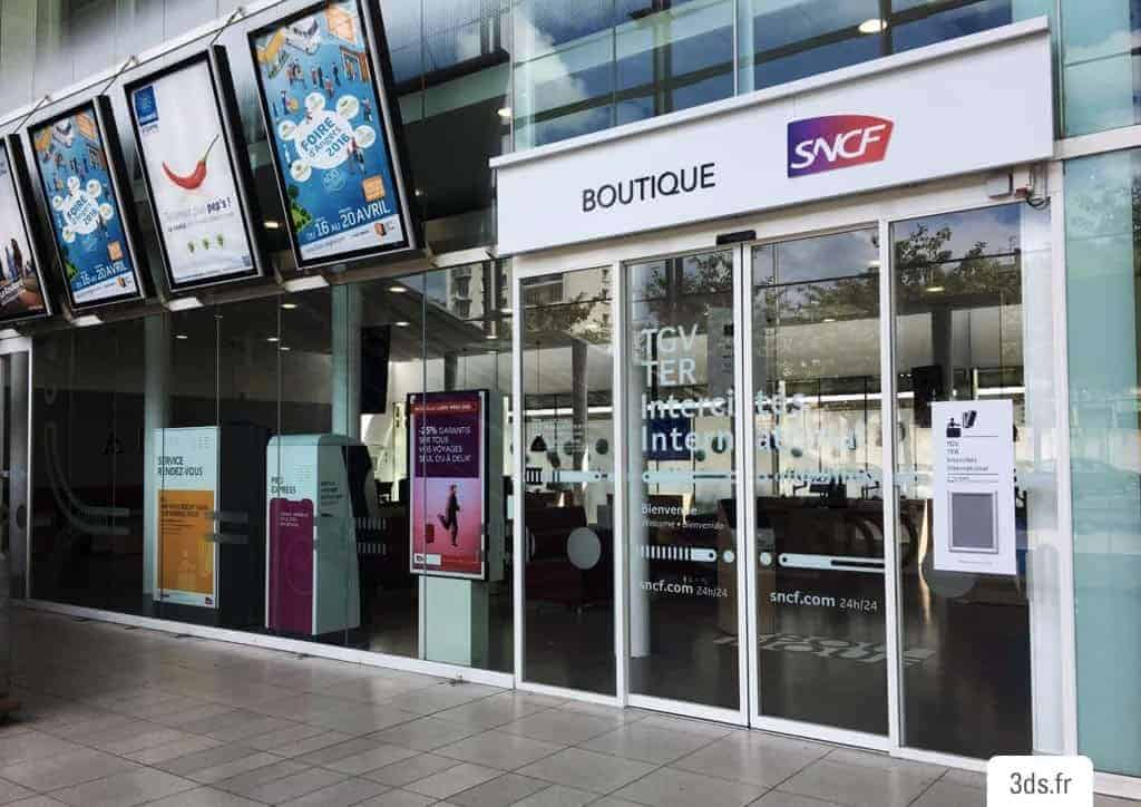 Enseigne adhésive sur mesure boutique gare SNCF