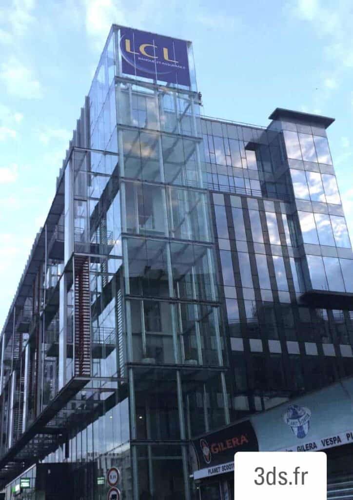 Enseigne facade vitrée extérieure immeuble bureau